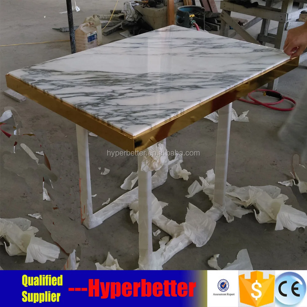 White quartz table top square with wrought iron table leg