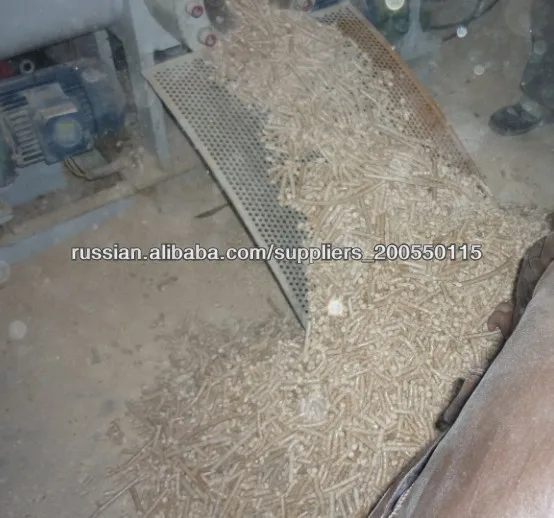 Automatic side stamping of wood briquettes, new particles