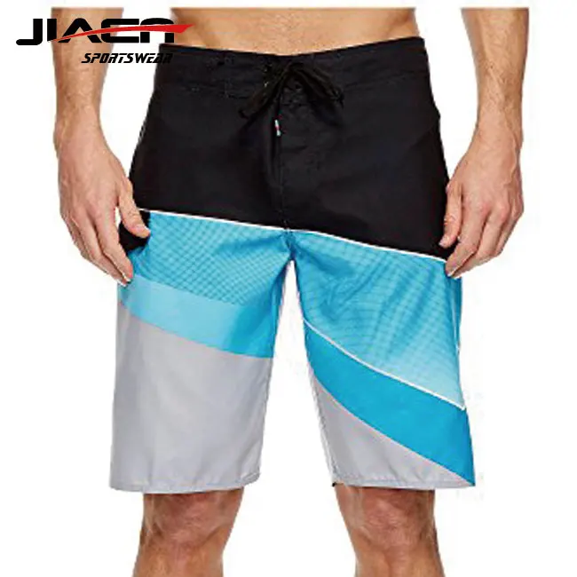 Custom wholesale pantone color waterproof 4 way stretch beach pants canadian board shorts for men