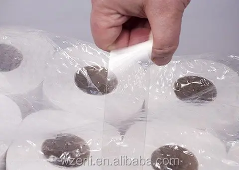 Adhesive carry handle belt for tissue roll or bottled water