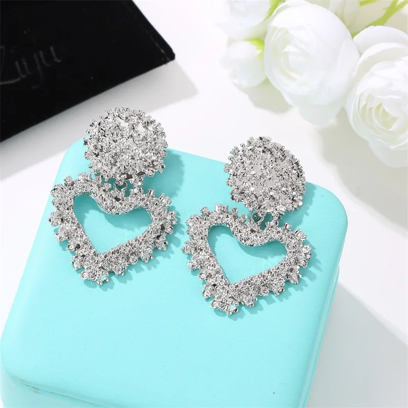 Fashion new heavy metal hollow love 14 k gold earrings