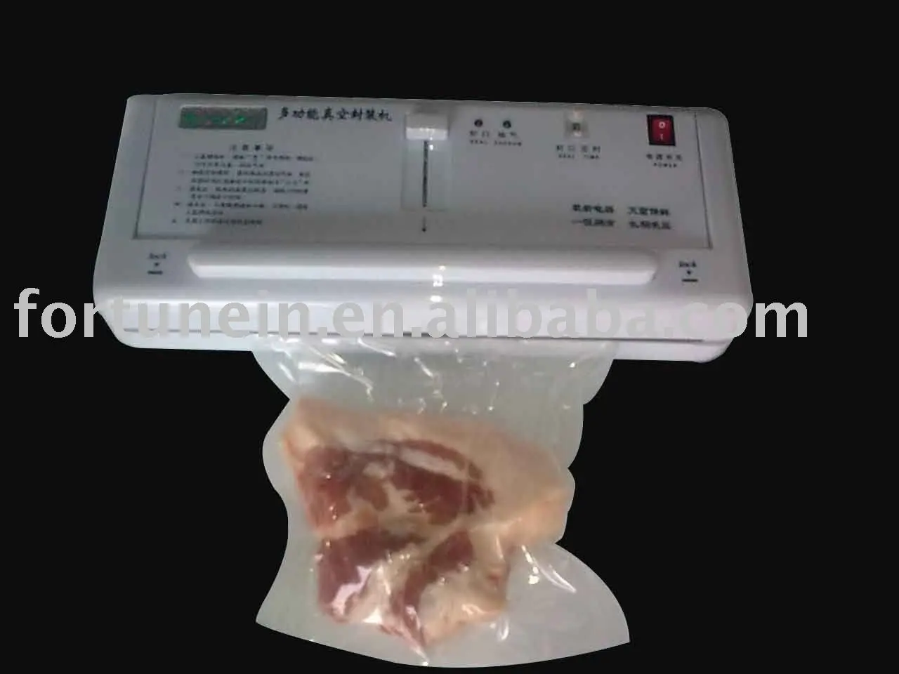 Вакуумный упаковщик