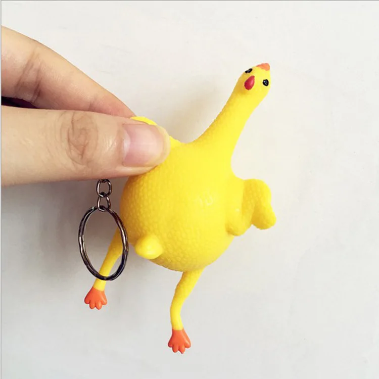 Hot sale  creative yellow chicken prank decompression funny toy rubber keychain