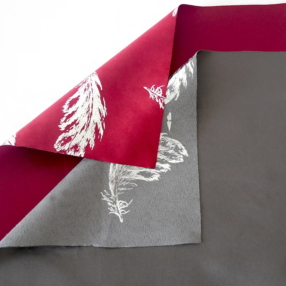 
Suede table runner,bronzed feather design 