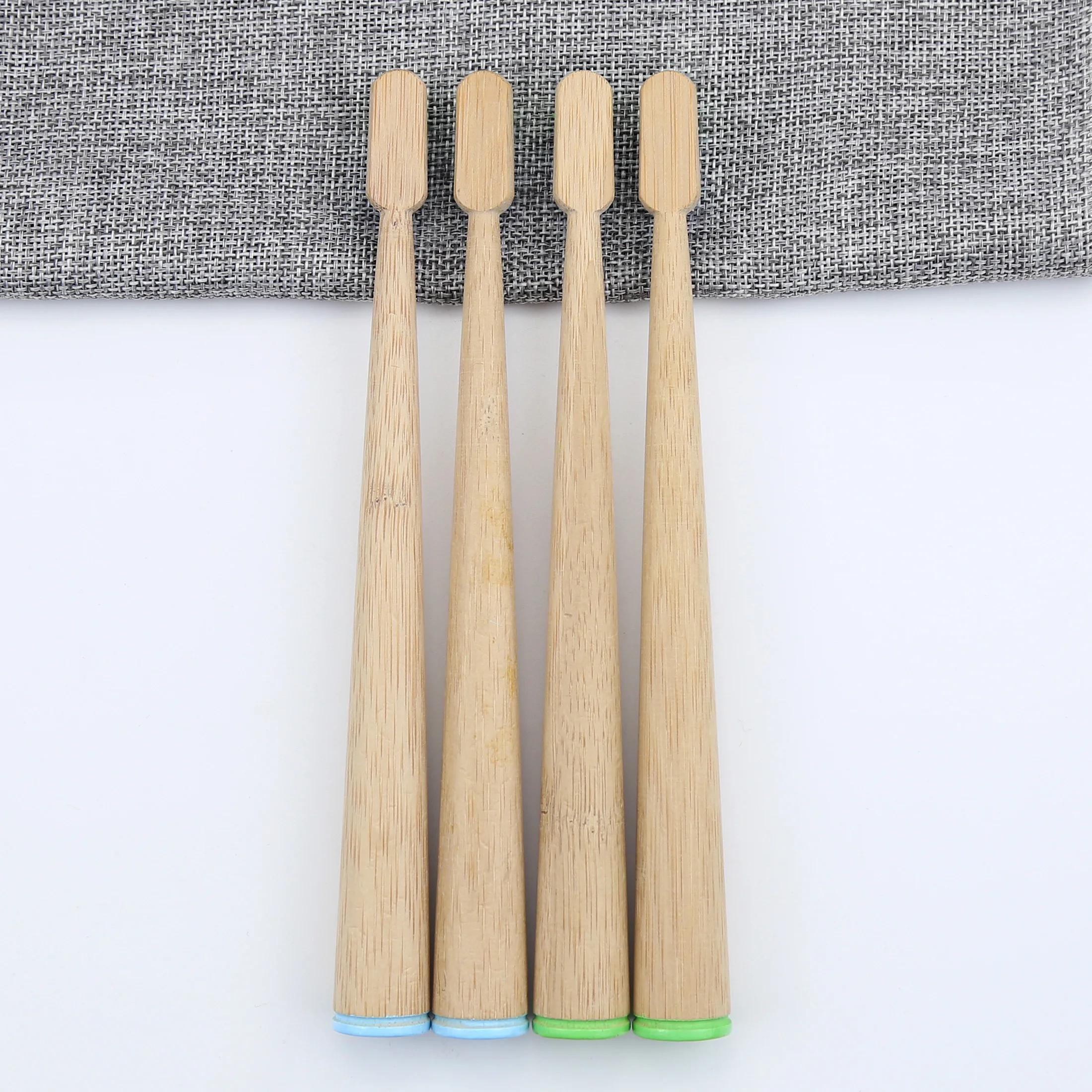 
conical handle biodegradable eco bamboo toothbrush with wavy end-rounded Dupont Nylon 612 super soft bristles 