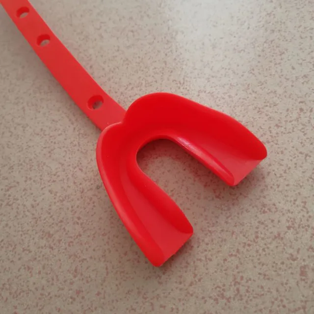 Strap mouth guard/gum shields for all contact sports