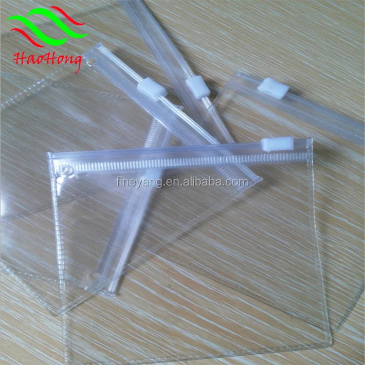 Wholesale clear soft vinyl pvc cosmetic zipper pouch/Plastic standing pvc zipper pouch bag with tear notch for snack