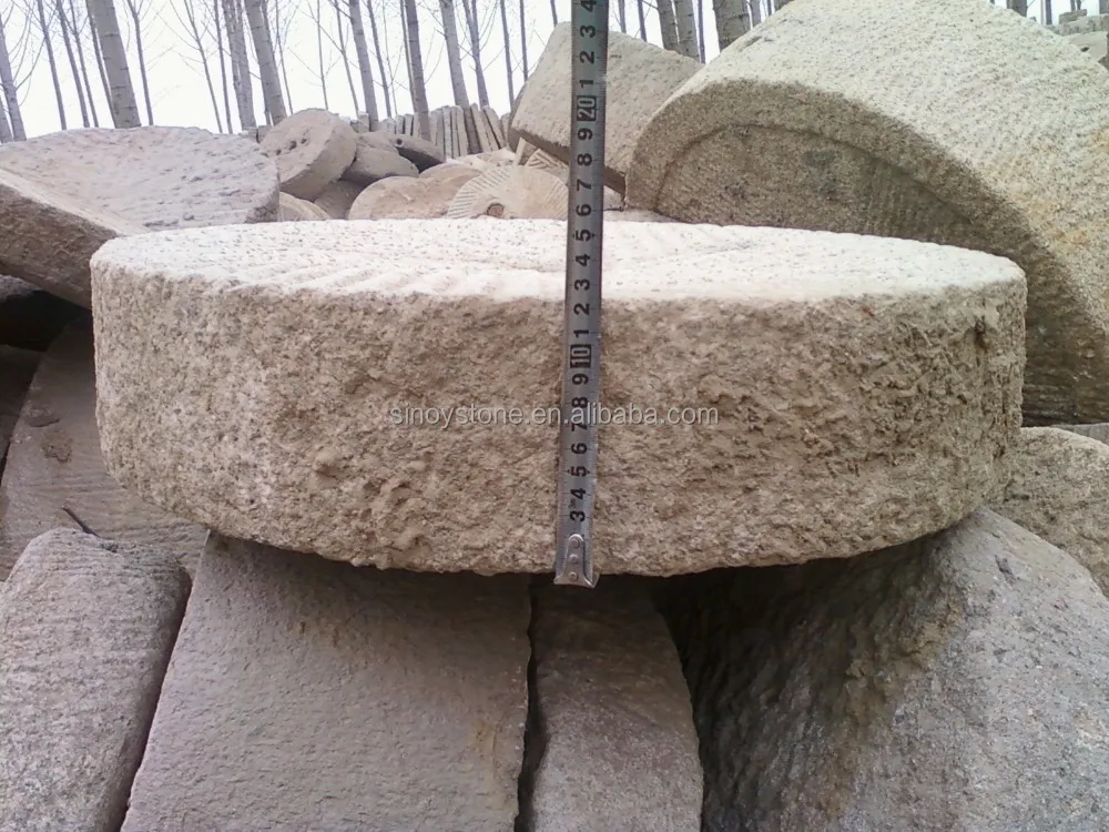 antique decorative old granite millstones