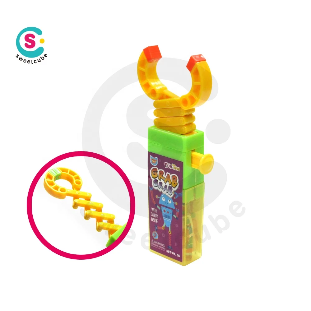 Sweetcube custom spring plastic toy with candy
