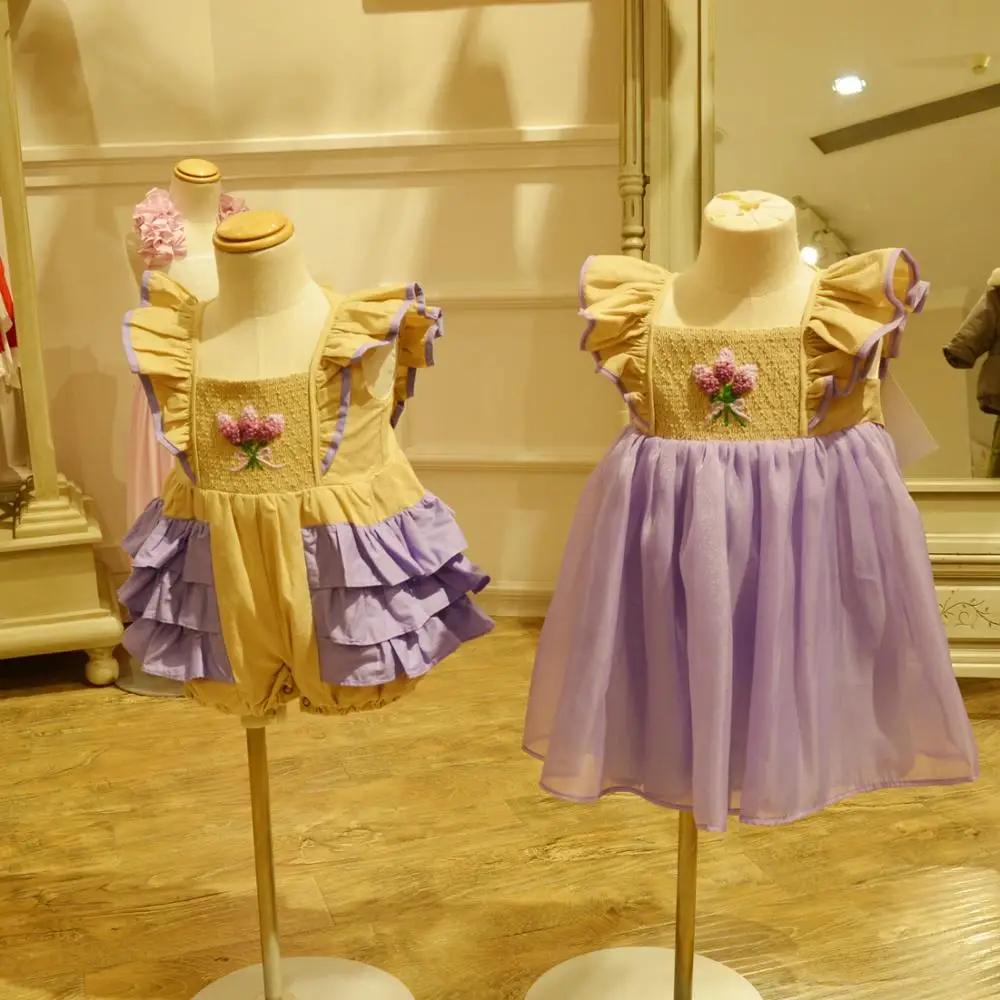 wholesale well dressed wolf remake lavender smocked dress for kids purple dress for girls