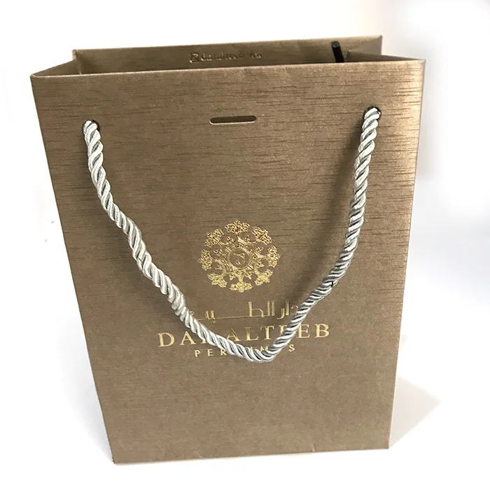 Custom logo printed cheap christmas fancy cosmetic paper shopping jewelry packaging gift bag with rope Twisted handle wholesale