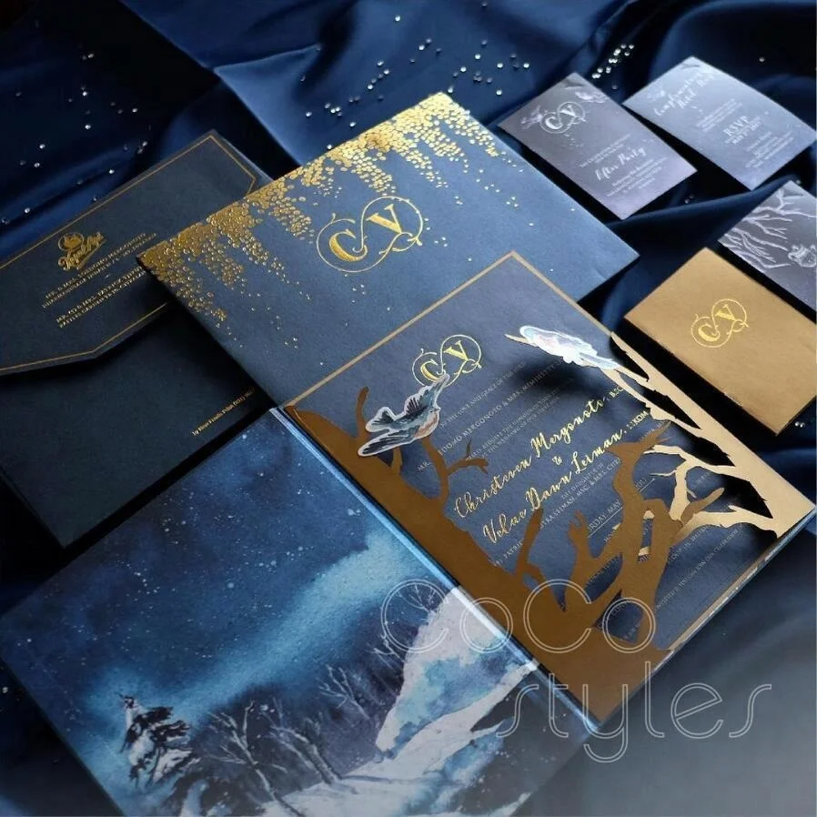 
Cocostyles bespoke creative gold foiling navy invitation card with snowflake and bird for winter wedding 