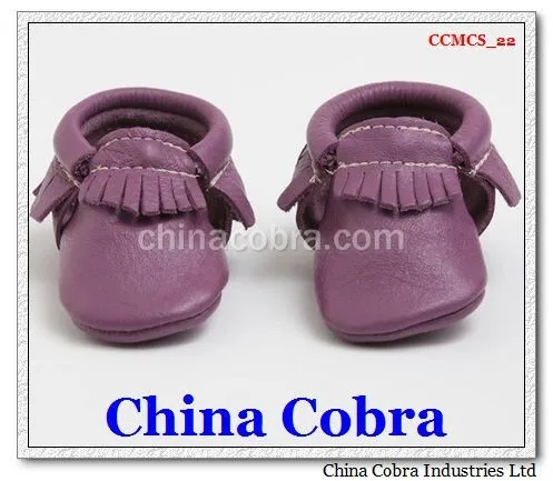 
soft sole leather baby moccasins shoes without the characters on them with fringe on them 