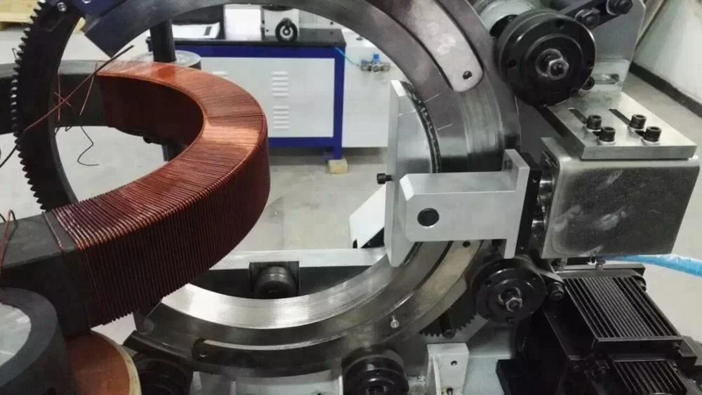 Dual-station toroidal coil winding machine and insulation tapping machine