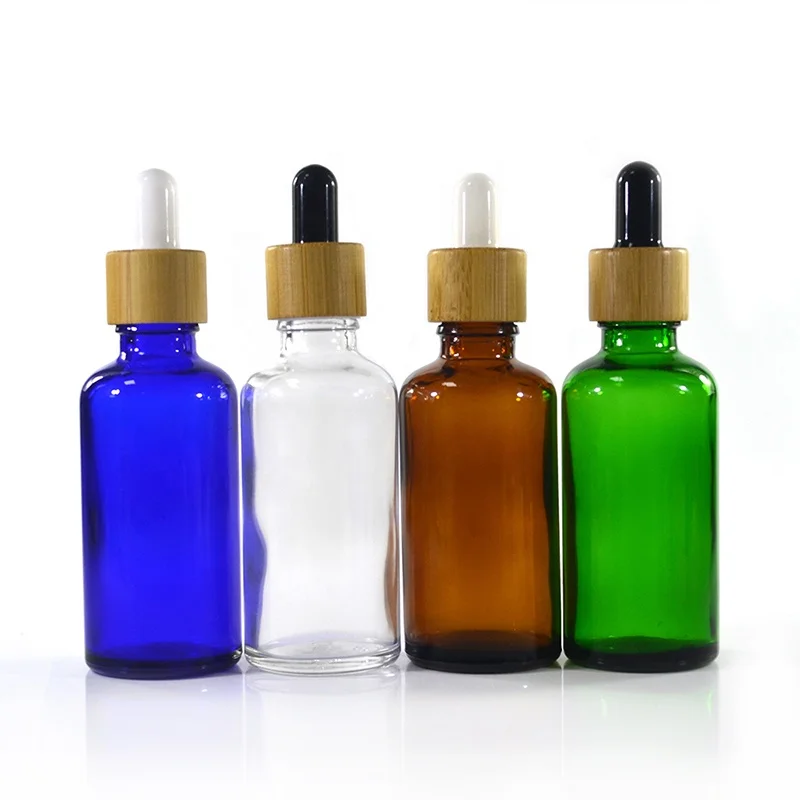 Cosmetic serum packaging 10ml 15ml 30ml 50ml 100ml amber blue green clear glass essential oil dropper bottle with bamboo cap