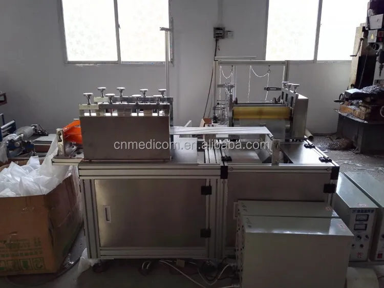 
disposable surgical nonwoven shoe cover making machine 