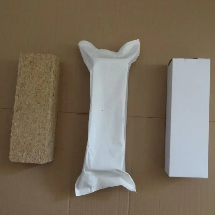 Rectangular-shaped sawdust fire wood log,made of wood fiber and paraffin