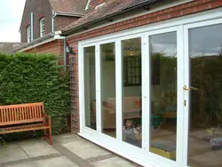 Soundproof thermal break wooden color Luxury Exterior Patio Lowes Glass Accordion Aluminium Bi-fold Doors