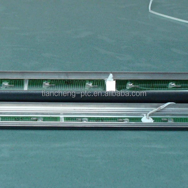 PTC bottom - mounted water heating plate