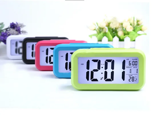 Classic LCD digital clock with calendar light sensor and alarm snooze