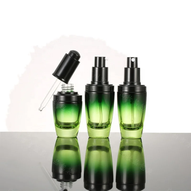 Wholesale High-grade Round clear Green Cosmetics Electroplating Glass Bottle/jars with Good Price