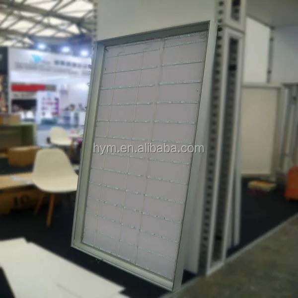 
white color LED lights behind textile graphic panel 