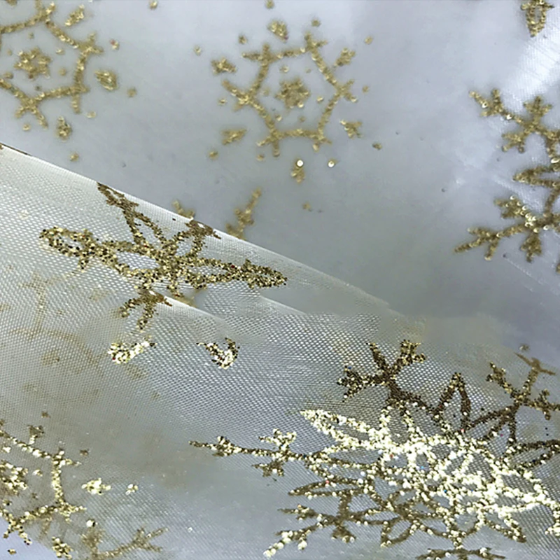 Ткань из органзы с узором в виде снежинок