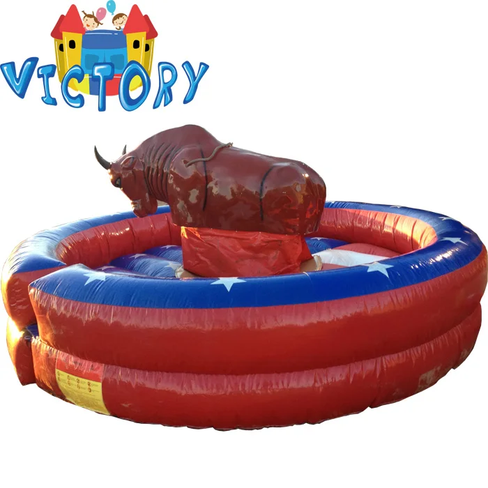 Giant Mechanical Rodeo Bull With Inflatable Mattress Interactive Game In Amusement Park