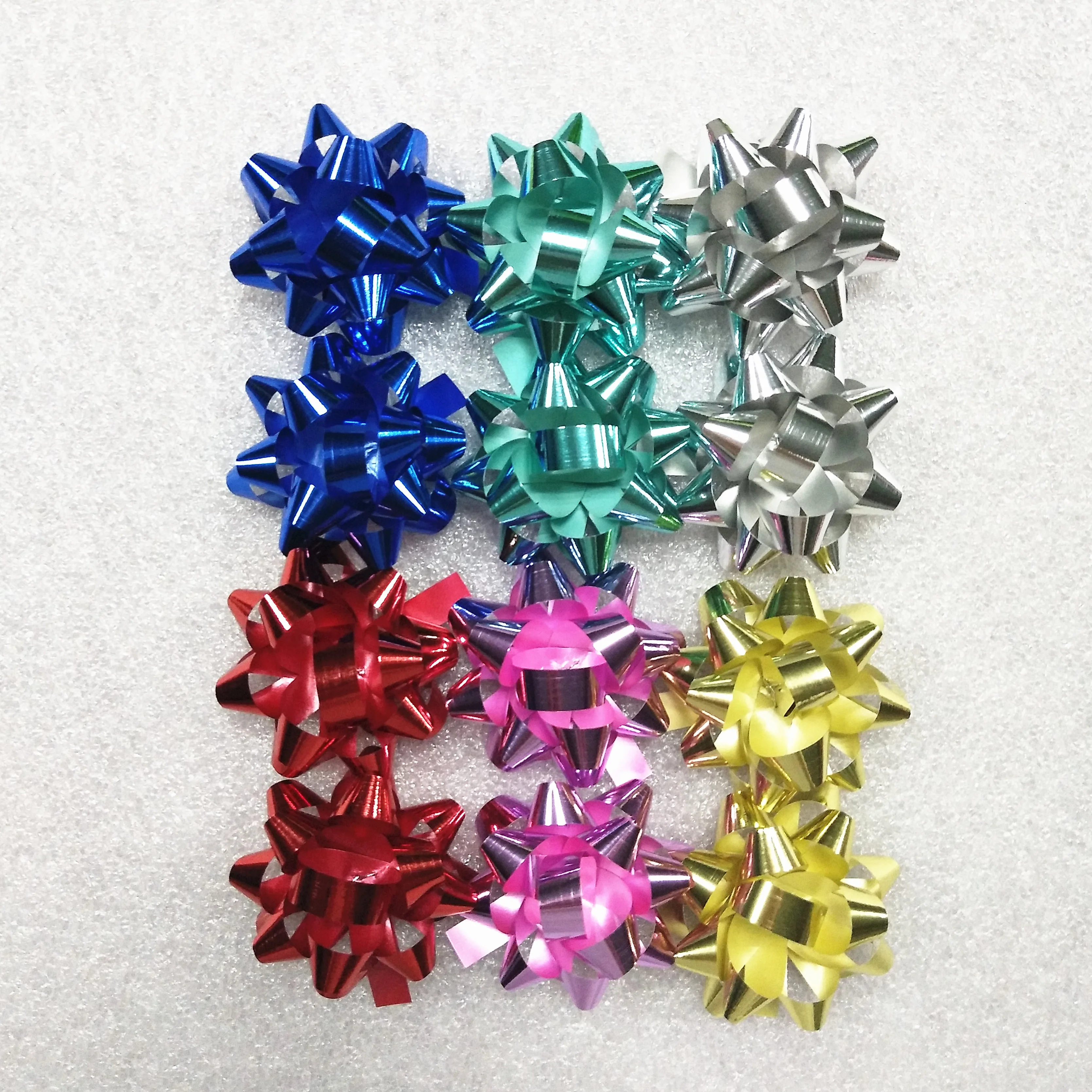 
12pk Peel N Stick 4cm Mini Star Bows for Gift Wrap 