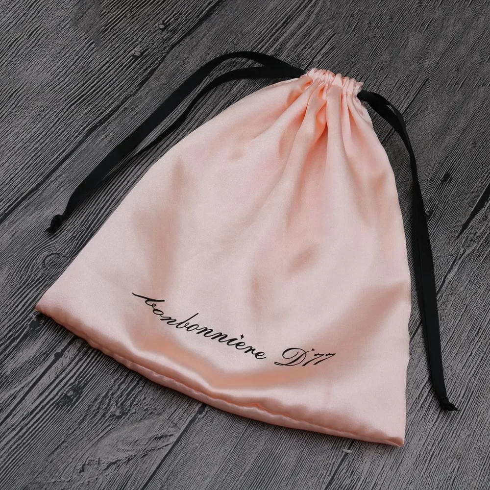 Pink satin bags for hair extensions with logo printed