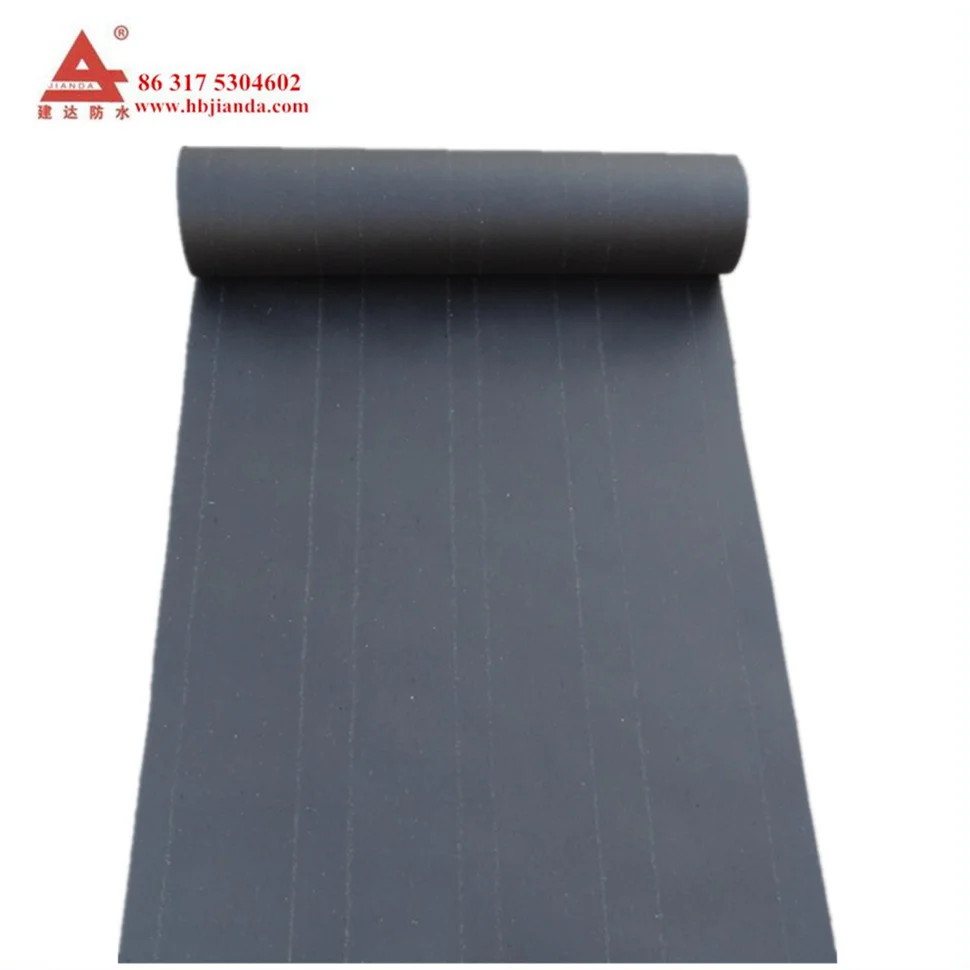 ASTM Asphalt Paper Rolling out the asphalt saturated felt paper in line with the drip edge