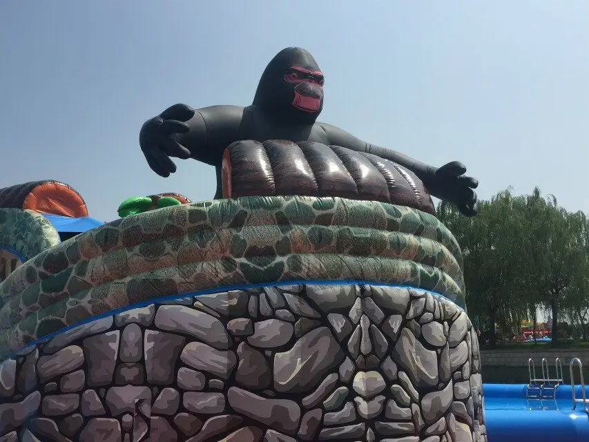 Guangzhou wholesale cheap price large inflatable water slide with steel frame swimming pool inflatable water park equipment 2018