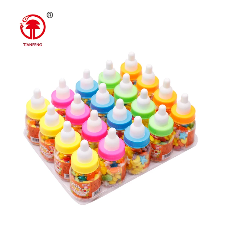 Confectionery toys hard press candy sweet halal chinese table press crayon candy with nipple packing