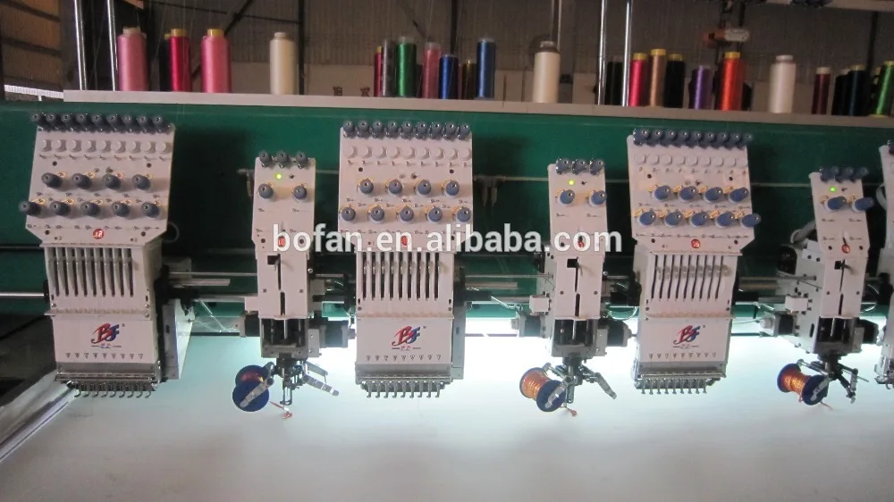 Industrial computerized embroidery machine with accessories