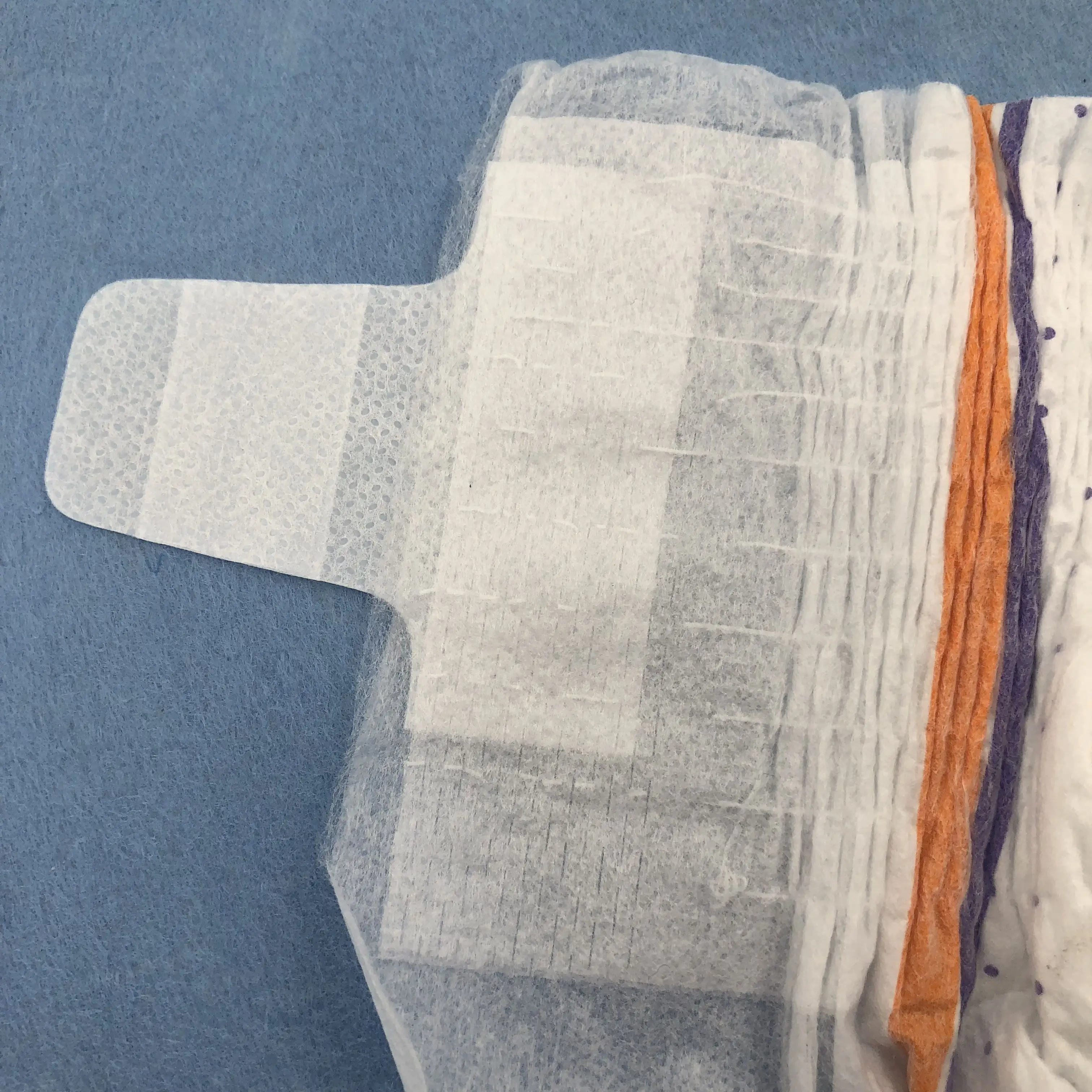 Low price disposable magic tape elastic waist band baby diapers manufacturer with OEM service