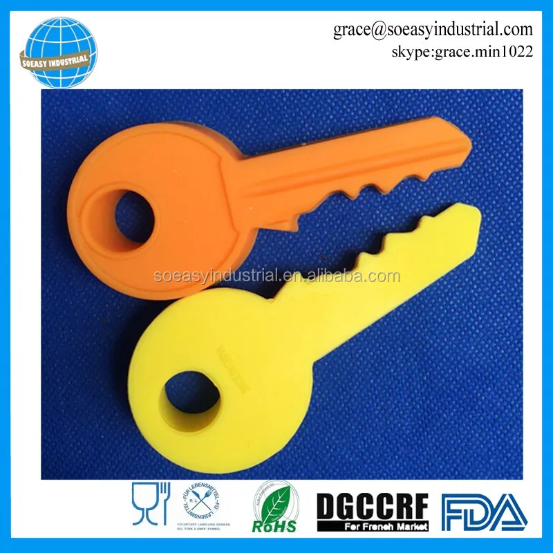 Novelty wedge key shape silicone door stops