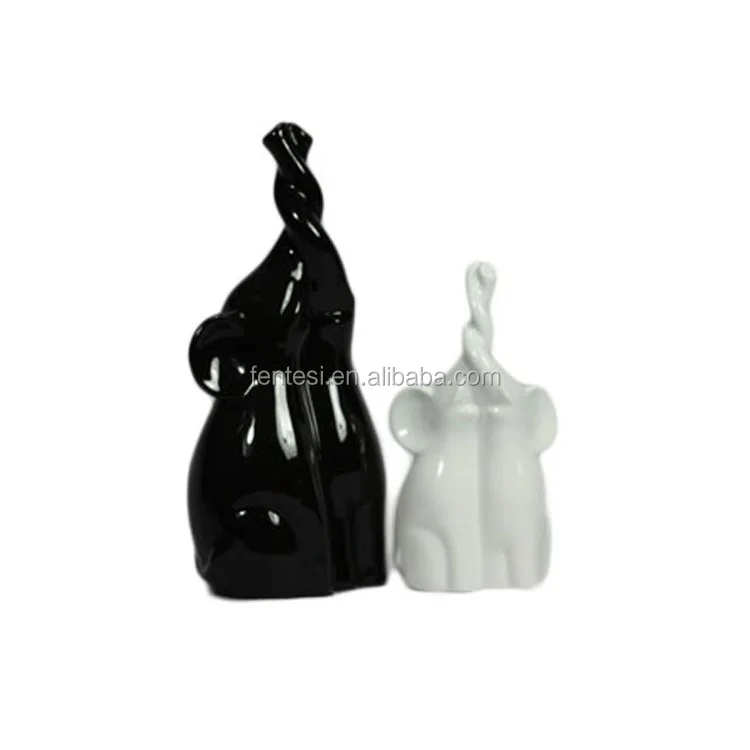 
2014 new design small glazed ceramic animal figurines black elephone 