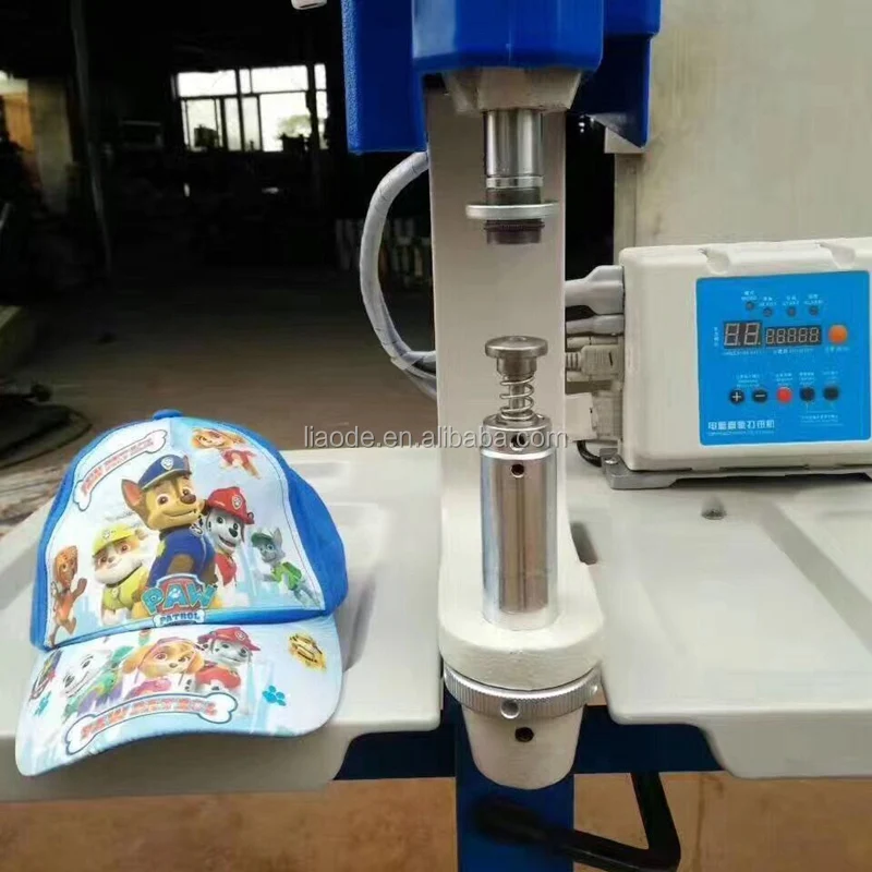 
LA-9-4M Semi-auto baseball cap fabric button attaching machine 