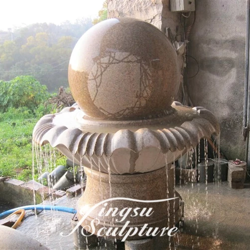 Hand carved granite spinning ball water fountain