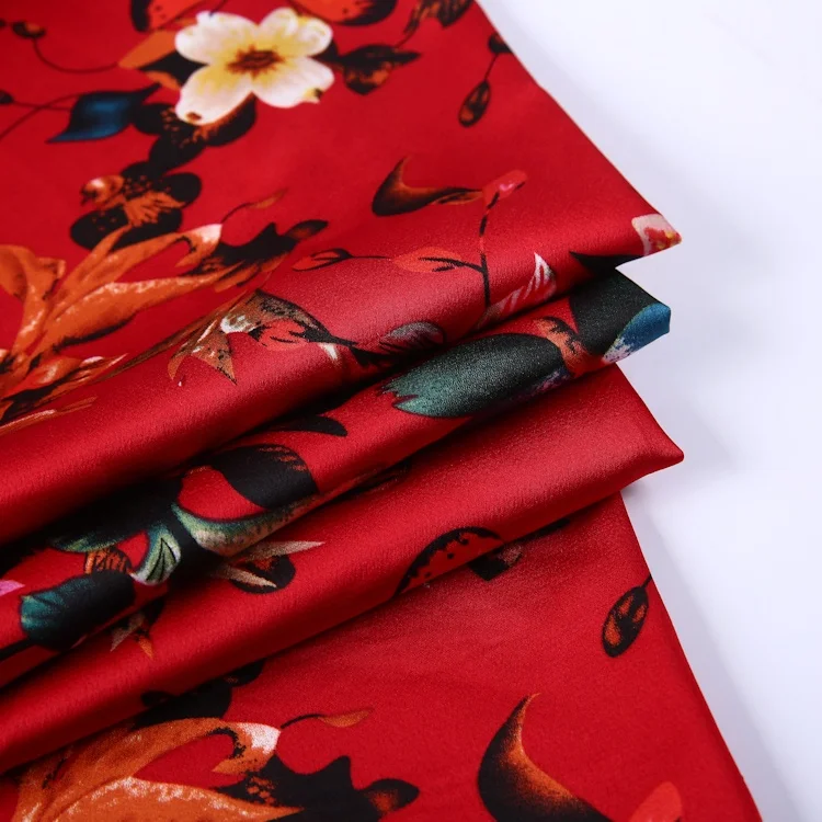 
High quality polyester floral pattern dress materials bubble satin fabric for women 