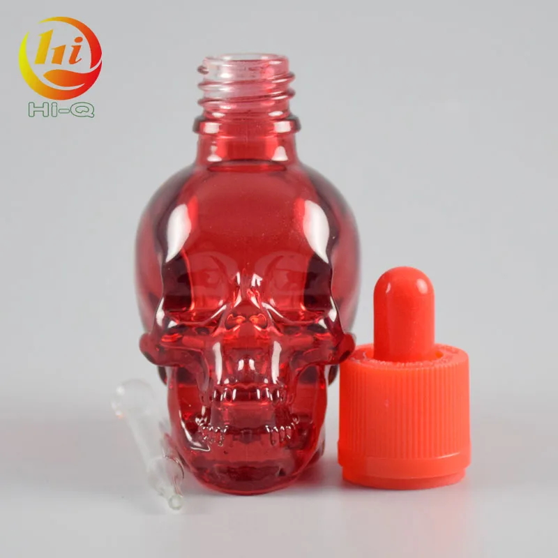unique shape glass liquid bottle 15ml 30ml 50ml clear skull glass dropper bottle