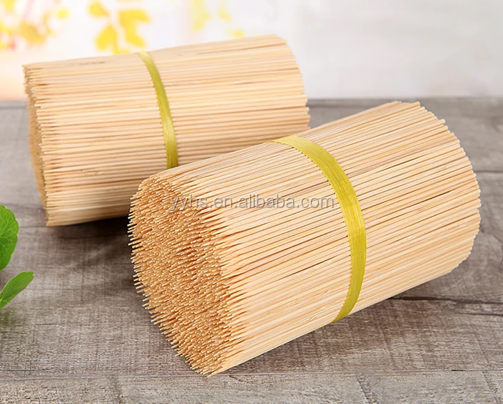 Pick up bamboo wooden sticks for meat