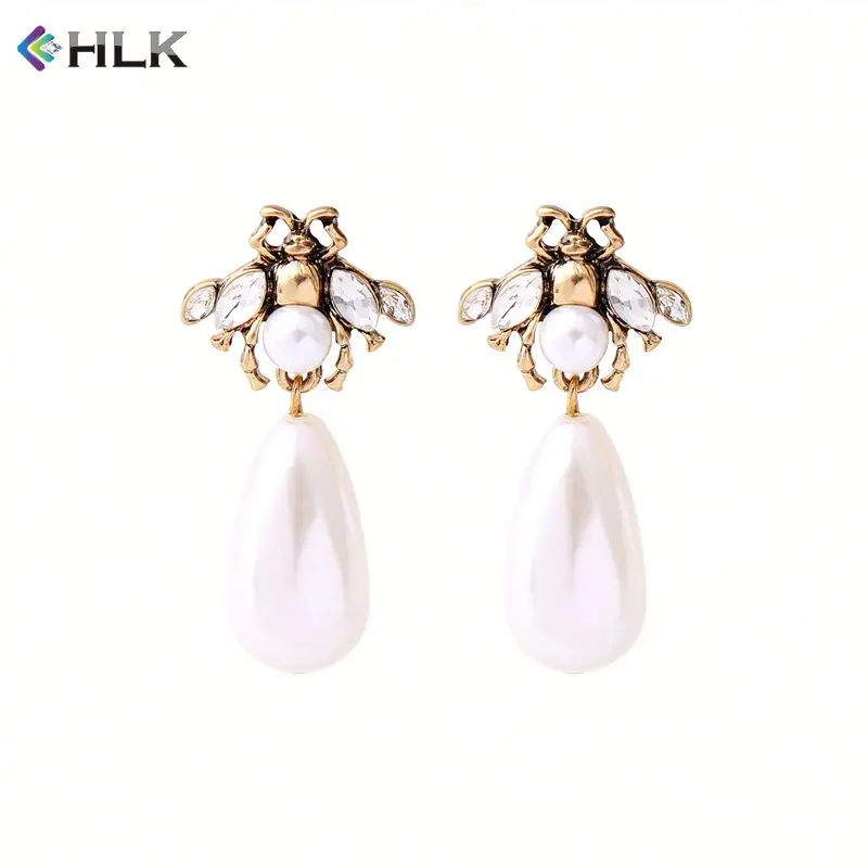 South indian bridal jewellery sets crawler Bee Pearl Earrings