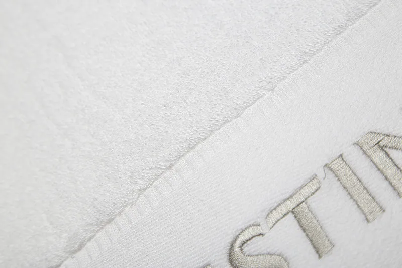 White towels with logo for Westin hotel