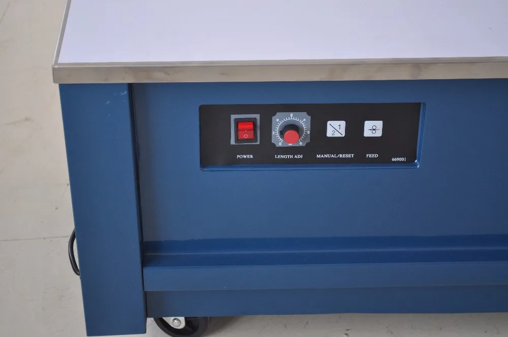 Small size semi-automatic strapping machine with low table