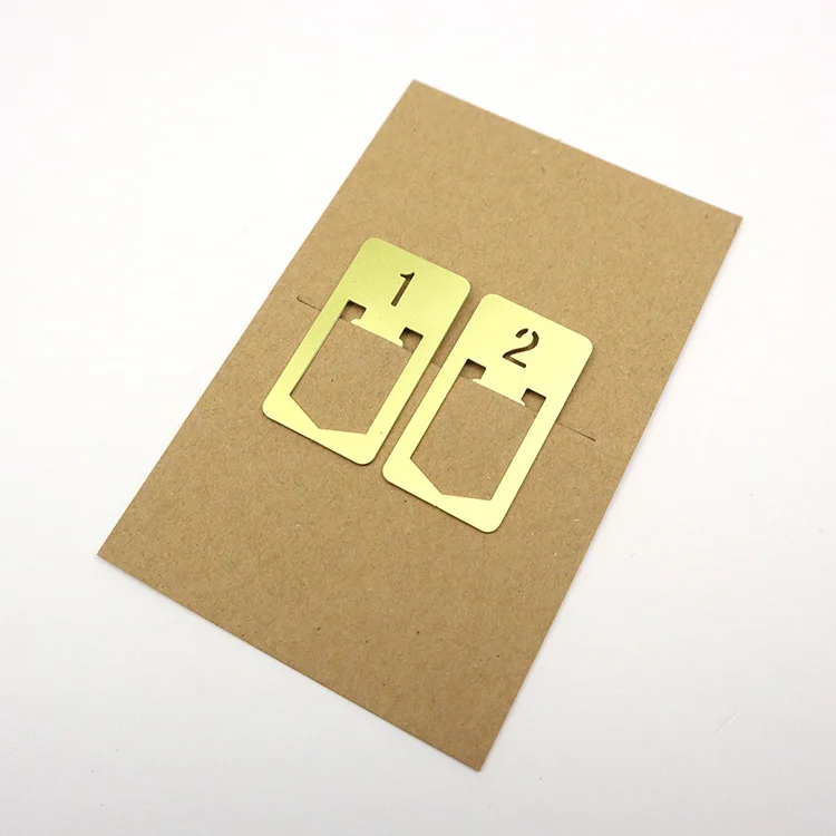 Gold metal brass paper clips number symbol