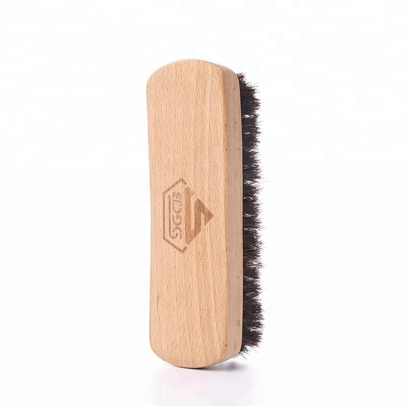 Scrub wooden dry brush in car washer