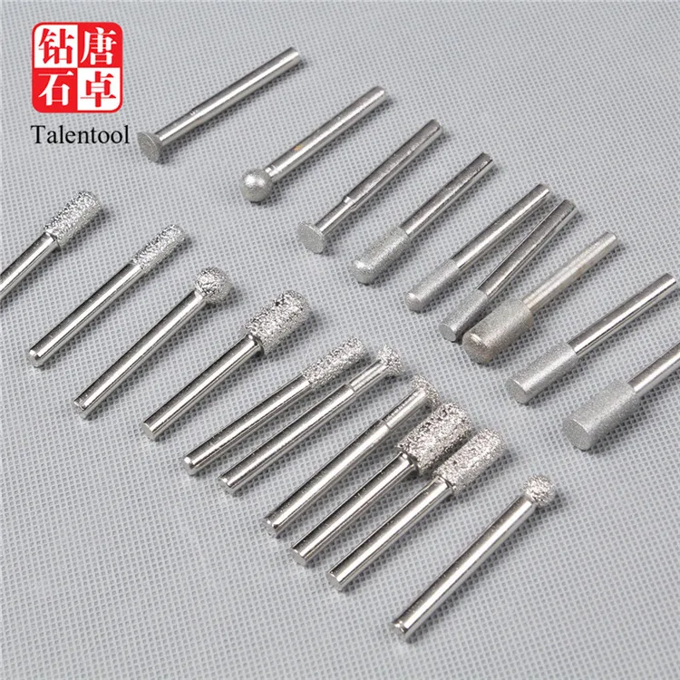 A diamond-encrusted diamond bit used for grinding and sculpting stone glass tiles