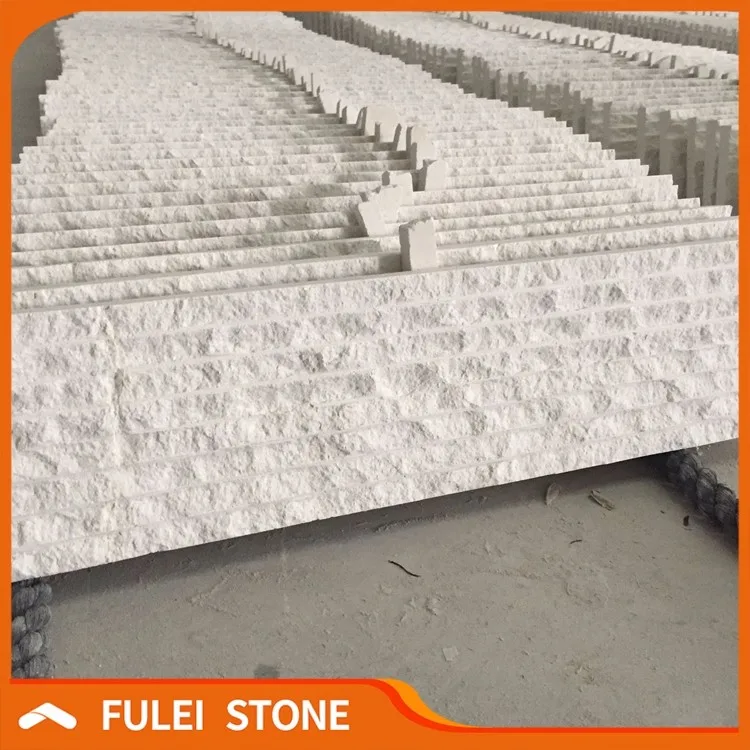 Облицовочная плитка из белого известняка с резной поверхностью