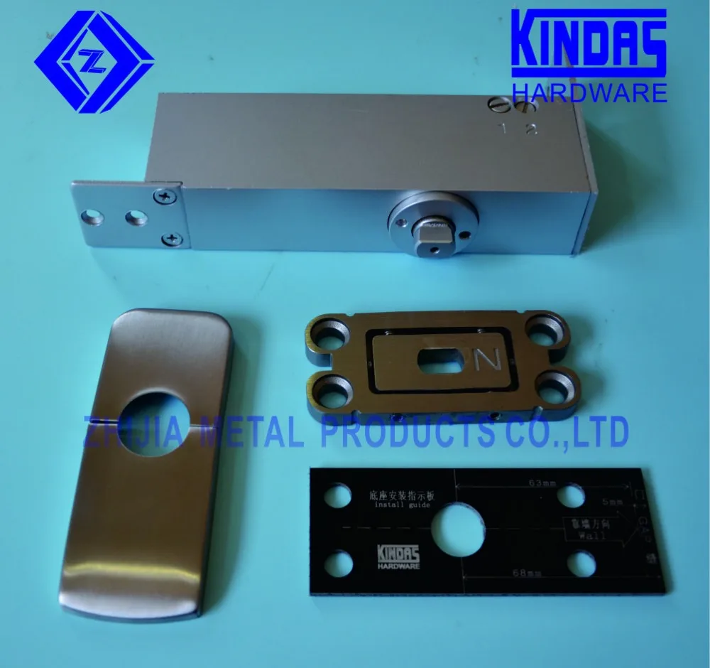 Concealed floor closer/floor hinge for wooden door